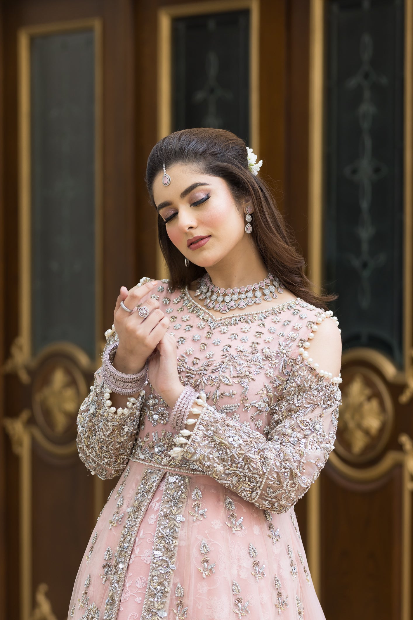 Pakistani formal pink gown with net shirt, organza lehenga, and dupatta – bridal-inspired reception outfit for wedding guests in Canada.